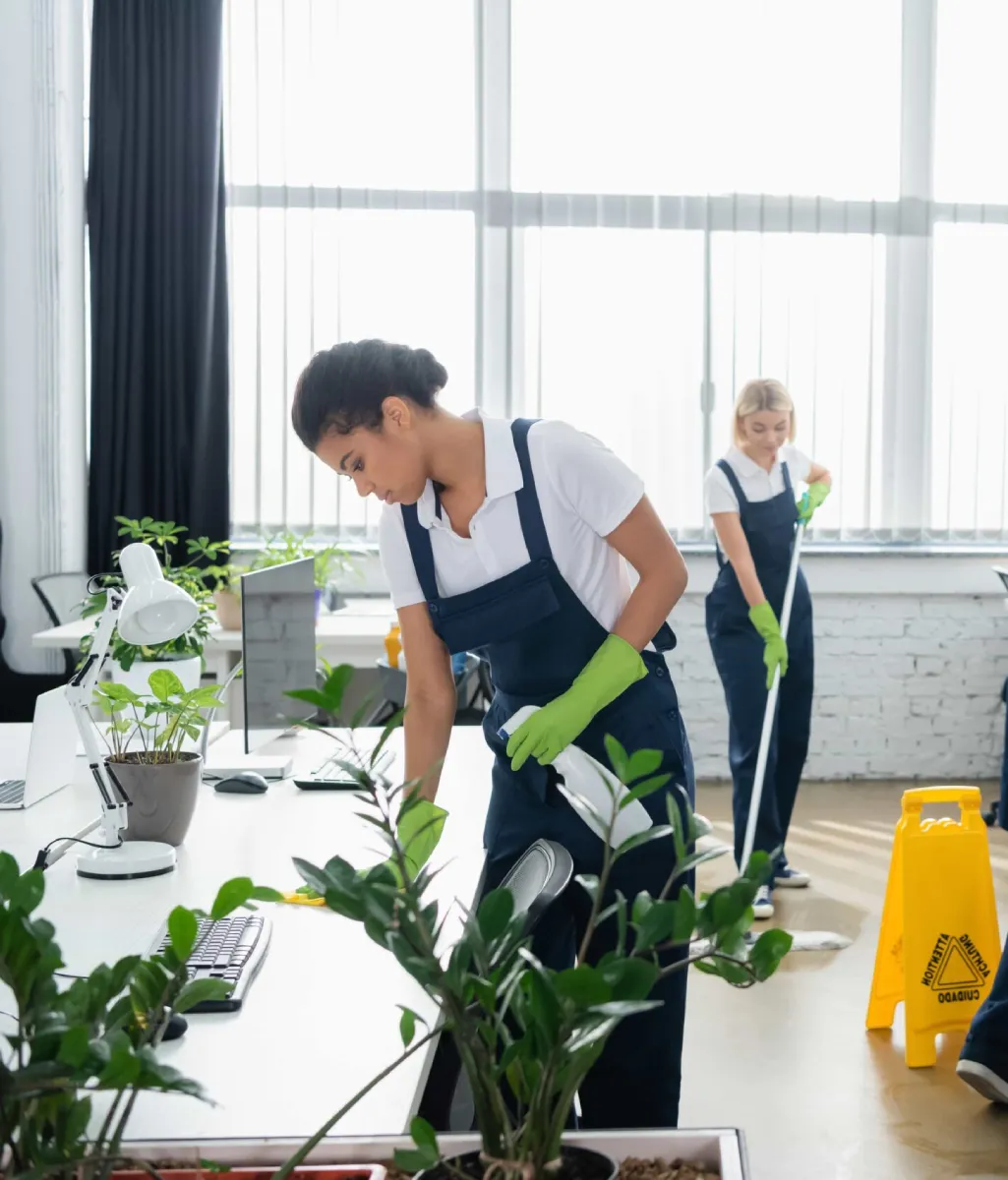 A team of janitors cleaning a commercial business.