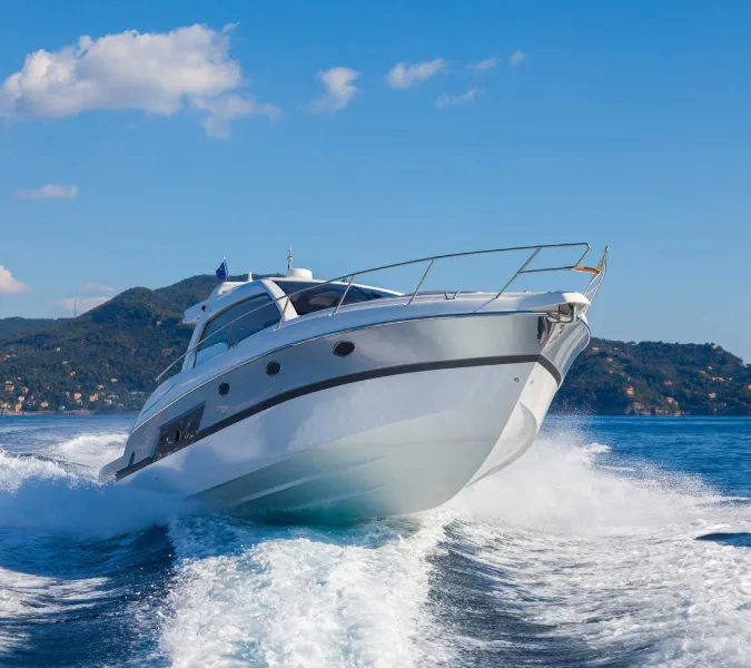 A boat cruising through the Kelowna waters.